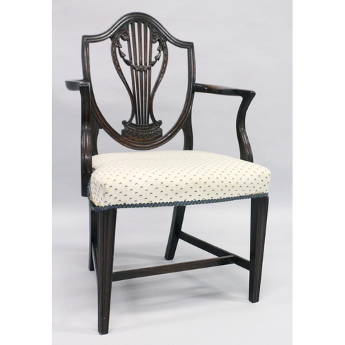 1013 - A GOOD HEPPLEWHITE MAHOGANY SHIELD BACK CHAIR with pierced vase splat, padded seat on square taperin... 