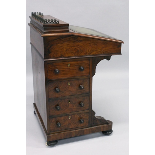 1014 - A GOOD VICTORIAN WALNUT DAVENPORT, brass grill, leather writing surface, fitted interior, four drawe... 