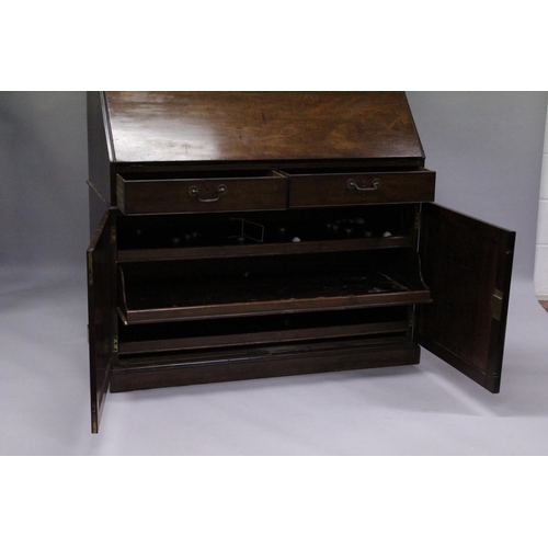 1015 - A GOOD GEORGE III MAHOGANY BUREAU BOOKCASE, the top with cornice over a pair of glazed doors with la... 