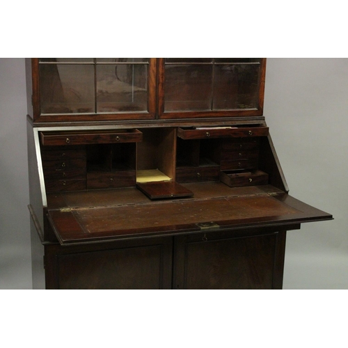 1015 - A GOOD GEORGE III MAHOGANY BUREAU BOOKCASE, the top with cornice over a pair of glazed doors with la... 