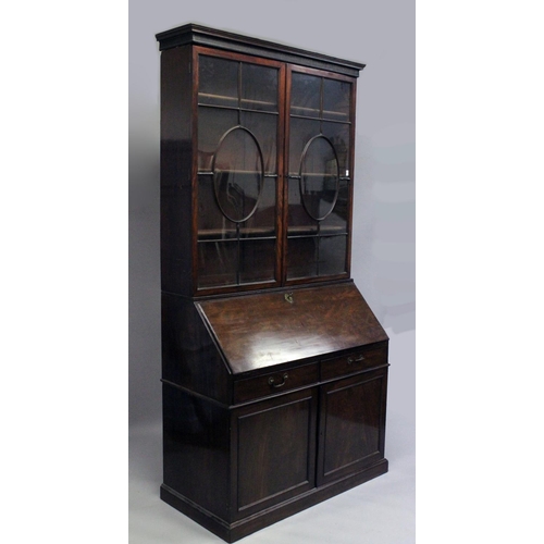 1015 - A GOOD GEORGE III MAHOGANY BUREAU BOOKCASE, the top with cornice over a pair of glazed doors with la... 