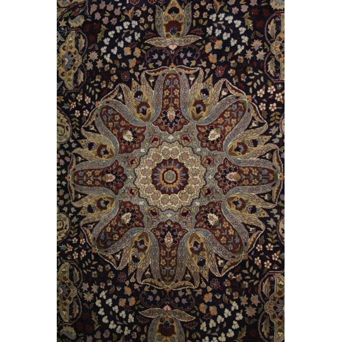 1019 - A GOOD KASHAN FLORAL RUG with large circular medallion on a blue ground 7ft 10 ins long x 4ft 5ins w... 