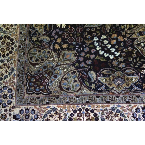 1019 - A GOOD KASHAN FLORAL RUG with large circular medallion on a blue ground 7ft 10 ins long x 4ft 5ins w... 