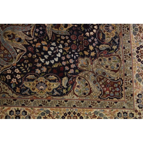 1019 - A GOOD KASHAN FLORAL RUG with large circular medallion on a blue ground 7ft 10 ins long x 4ft 5ins w... 