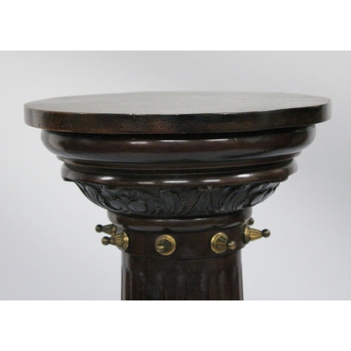 1021 - A GOOD PAIR OF 19TH CENTURY AESTHETIC MAHOGANY STANDS with circular tops gilded fluted column on thr... 