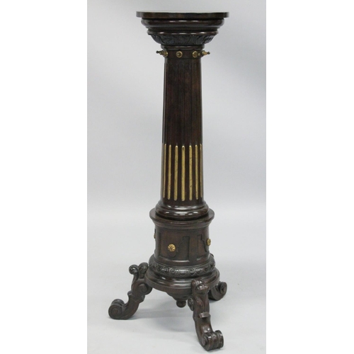 1021 - A GOOD PAIR OF 19TH CENTURY AESTHETIC MAHOGANY STANDS with circular tops gilded fluted column on thr... 