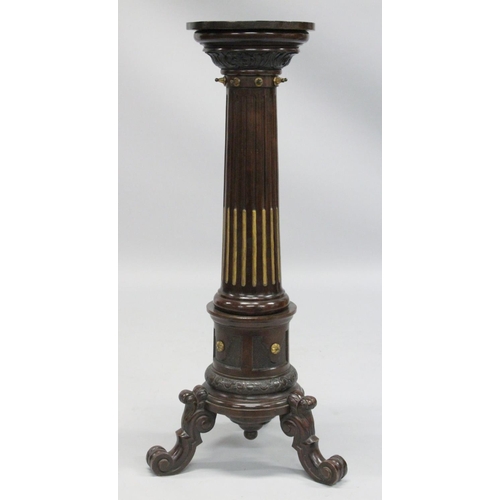 1021 - A GOOD PAIR OF 19TH CENTURY AESTHETIC MAHOGANY STANDS with circular tops gilded fluted column on thr... 