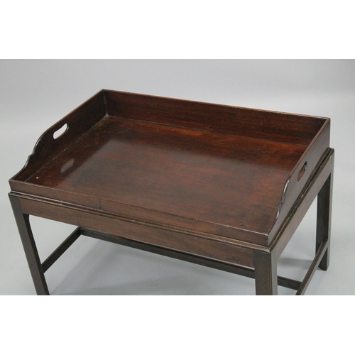 1024 - A 19TH/ 20TH CENTURY MAHOGANY BUTLERS TRAY on stand. 2ft 10ins long x 1ft 1.0.5ins wide x 1ft 11ins ... 