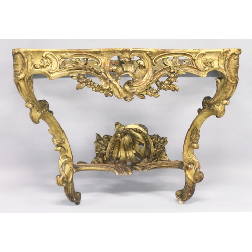 1026 - A VERY GOOD NEAR PAIR OF 18TH CENTURY CARVED AND GILDED CONSOLE TABLES with serpentine marble tops. ... 