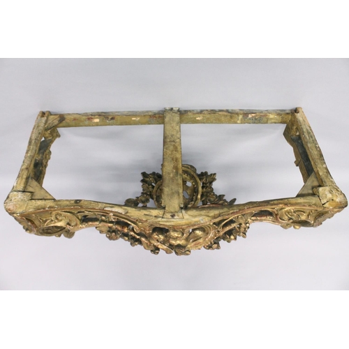 1026 - A VERY GOOD NEAR PAIR OF 18TH CENTURY CARVED AND GILDED CONSOLE TABLES with serpentine marble tops. ... 