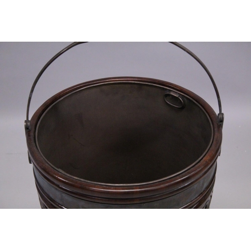 1027 - A LARGE MAHOGANY PEAT BUCKET, possibly Irish. 2ft 2ins high.