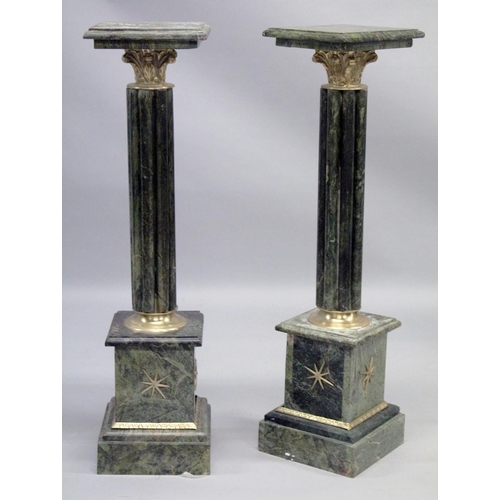 1028 - A PAIR OF MARBLE COLUMNS with square top.