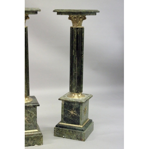 1028 - A PAIR OF MARBLE COLUMNS with square top.