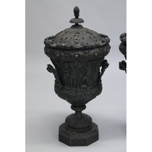 1046 - A GOOD PAIR OF CLASSICAL STYLE CARVED WOOD TWIN HANDLED PEDESTAL URNS. 2ft 10ins high.