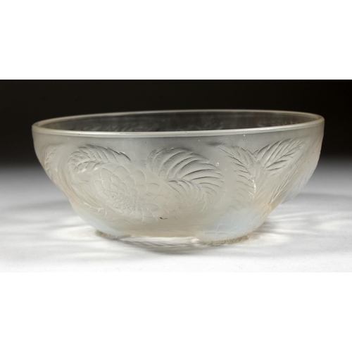 1085 - A LALIQUE CIRCULAR BOWL with flowers in iridescent blue. 9ins diameter. Mark R. LALIQUE, FRANCE.