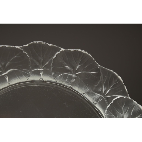 1088 - A LALIQUE GLASS CIRCULAR PLATE, the sides with leaves.