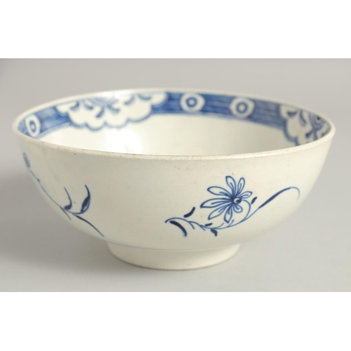 1111 - AN 18TH CENTURY WORCESTER BOWL painted with the uncommon Late Rock Floral pattern, crescent mark.