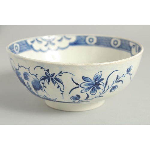 1111 - AN 18TH CENTURY WORCESTER BOWL painted with the uncommon Late Rock Floral pattern, crescent mark.