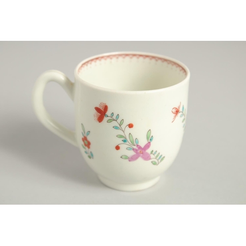 1123 - TWO 18TH CENTURY WORCESTER COFFEE CUPS, one painted with a large bouquet of flowers. scattered with ... 