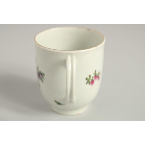 1123 - TWO 18TH CENTURY WORCESTER COFFEE CUPS, one painted with a large bouquet of flowers. scattered with ... 