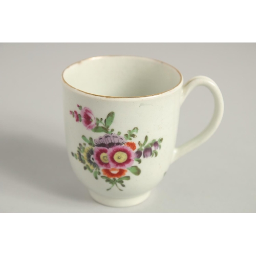 1123 - TWO 18TH CENTURY WORCESTER COFFEE CUPS, one painted with a large bouquet of flowers. scattered with ... 