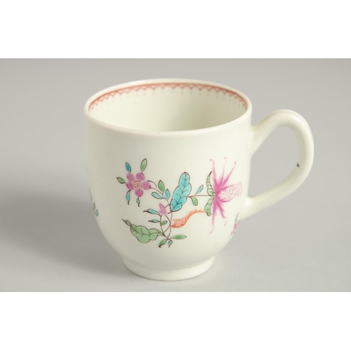 1123 - TWO 18TH CENTURY WORCESTER COFFEE CUPS, one painted with a large bouquet of flowers. scattered with ... 