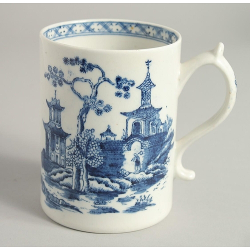 1137 - AN 18TH CENTURY LOWESTOFT FINE MUG printed with Chinese landscape and boat, near an island.