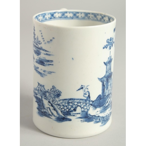 1137 - AN 18TH CENTURY LOWESTOFT FINE MUG printed with Chinese landscape and boat, near an island.