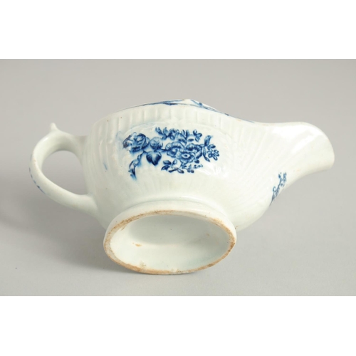 1138 - AN 18TH CENTURY LOWESTOFT FINE SMALL SAUCE BOAT with a pleat moulded body and moulded cartouches pri... 