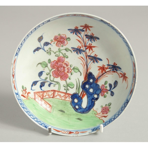 1146 - AN 18TH CENTURY LOWESTOFT FINE TEA BOWL AND SAUCER painted with a Redgrave style landscape with poly... 