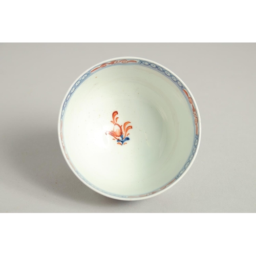 1146 - AN 18TH CENTURY LOWESTOFT FINE TEA BOWL AND SAUCER painted with a Redgrave style landscape with poly... 