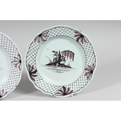 1152 - A SET OF FOUR 19TH CENTURY SEPIA DESIGN PLATES with Fence pattern and buildings. 8ins diameter.