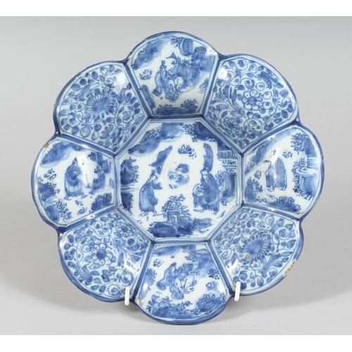 1155 - A 19TH CENTURY BLUE AND WHITE DEEP CHARGER with Chinese design. 9ins diameter.