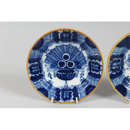 1158 - THREE SMALL 19TH CENTURY BLUE TIN GLAZE PLATES. 6ins diameter.