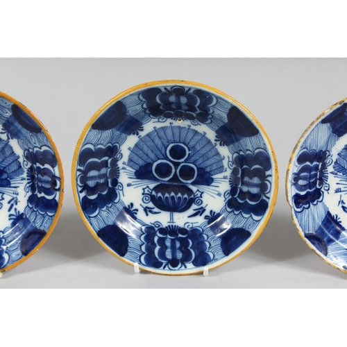 1158 - THREE SMALL 19TH CENTURY BLUE TIN GLAZE PLATES. 6ins diameter.