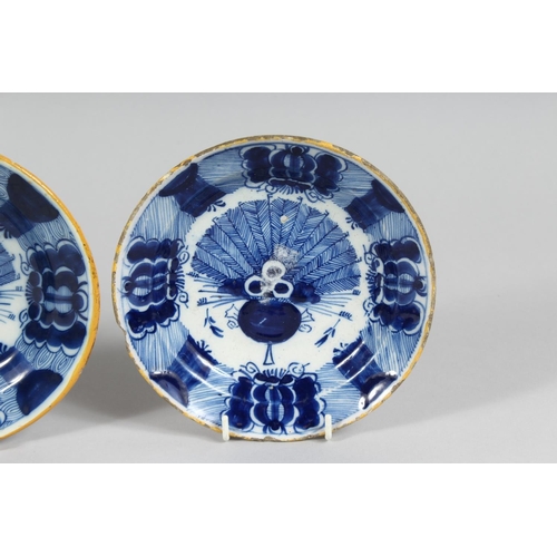 1158 - THREE SMALL 19TH CENTURY BLUE TIN GLAZE PLATES. 6ins diameter.