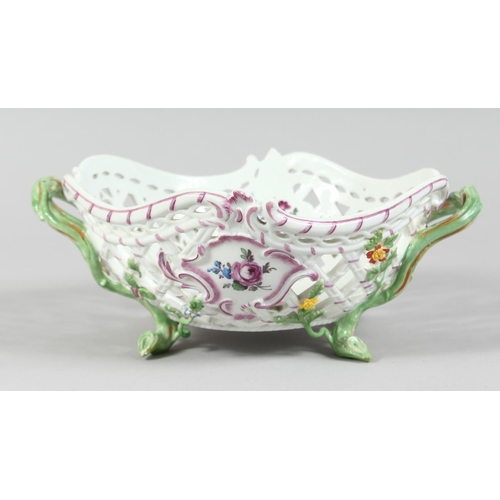 1160 - A GOOD MEISSEN PIERCED TWO HANDLED BASKET painted and encrusted with flowers. Cross swords mark in b... 