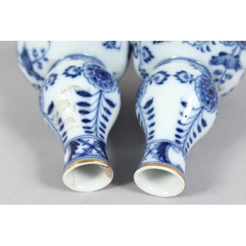 1167 - A SMALL PAIR OF MEISSEN ONION PATTERN BOTTLE VASES. Cross swords mark in blue, 4.5ins high.