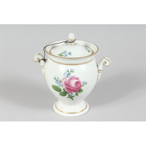 1168 - A FOUR PIECE MEISSEN PORCELAIN TEA SET, painted with roses. Cross swords mark in blue.