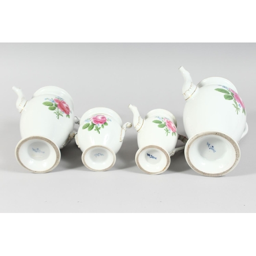 1168 - A FOUR PIECE MEISSEN PORCELAIN TEA SET, painted with roses. Cross swords mark in blue.