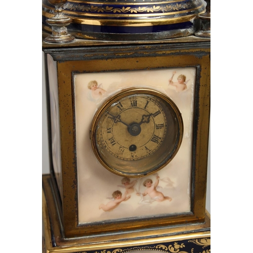 1169 - A VERY GOOD 19TH CENTURY VIENNA PORCELAIN CLOCK with metal supports and painted panels with cupids a... 