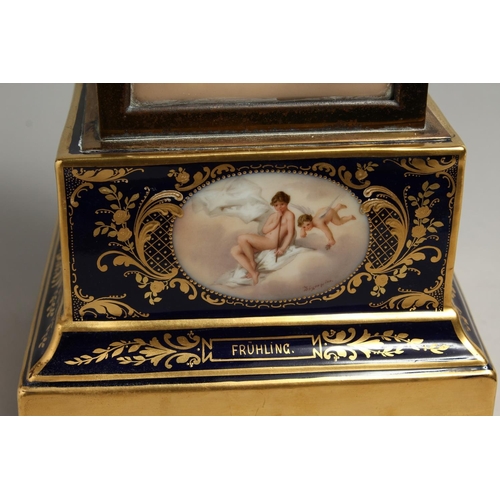 1169 - A VERY GOOD 19TH CENTURY VIENNA PORCELAIN CLOCK with metal supports and painted panels with cupids a... 