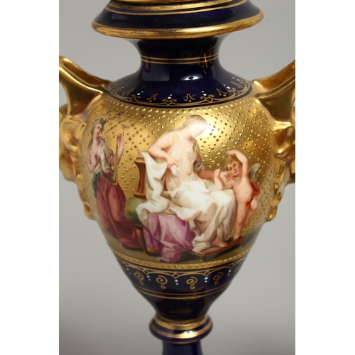 1170 - A SUPERB PAIR OF 19TH CENTURY VIENNA URNS VASES, COVERS AND STANDS, rich blue ground decorated in gi... 