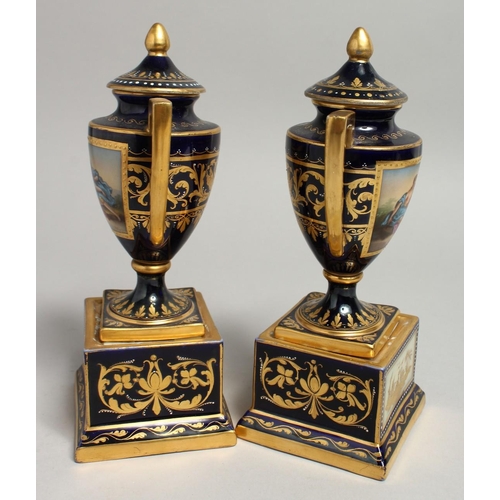 1171 - A SUPERB SMALL PAIR OF VIENNA URNS, COVERS AND STANDS rich gilt decoration and painted classical sce... 