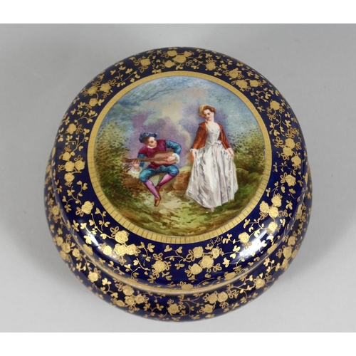 1172 - A GOOD 19TH CENTURY SHAPED PORCELAIN CIRCULAR BOX AND COVER, blue and gilt ground, the lid painted w... 