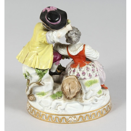 1175 - A GOOD MEISSEN PORCELAIN GROUP OF A BOY AND GIRL with garlands of flowers on an oval base. Cross swo... 