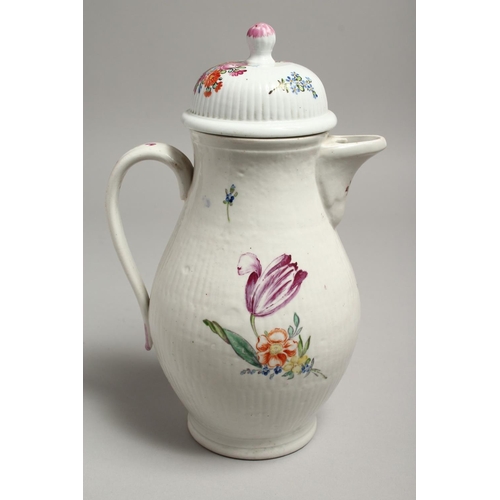 1191 - A GOOD COFFEE POT AND COVER painted with flowers. 11ins high.