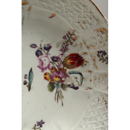 1195 - A MEISSEN PLATE painted with flowers. Cross swords mark in blue. 8ins diameter.