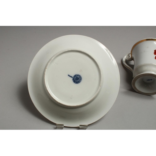 1196 - A 19TH CENTURY BERLIN CUP AND SAUCER, white ground edged in gilt. Sceptre mark in blue.