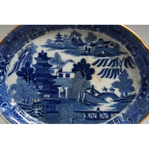 1197 - TWO BLUE AND WHITE WILLOW PATTERN DISHES.